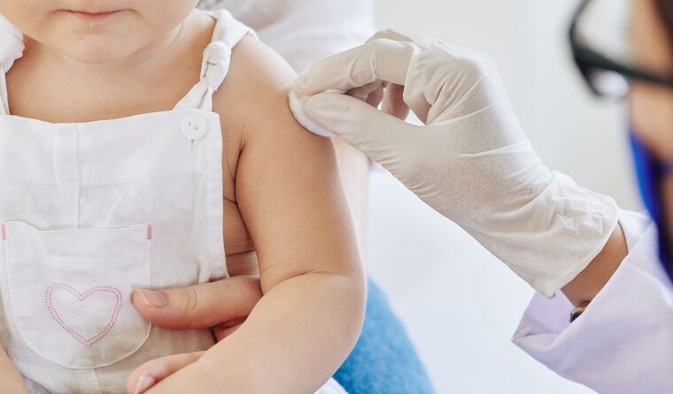 Infant receiving vaccination.