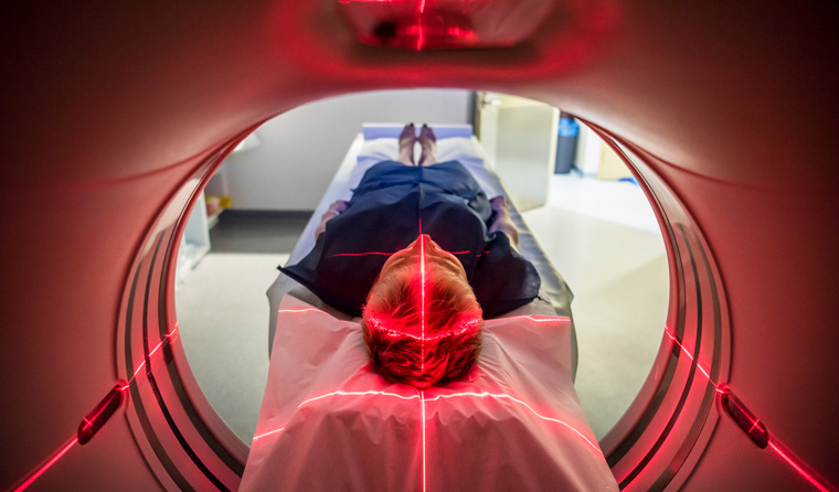 Patient entering an MRI machine.