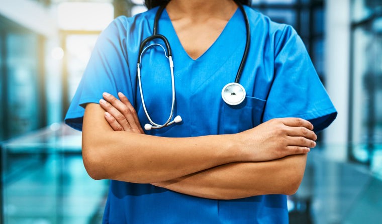 Nurse with arms folded