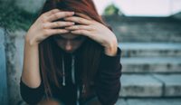 Young woman suffering mental distress