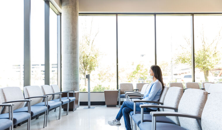 One person sitting in waiting room.