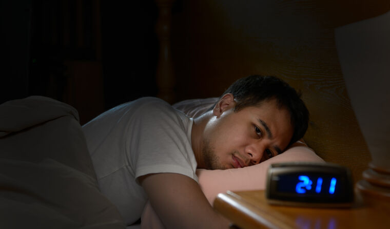 Man suffering from insomnia
