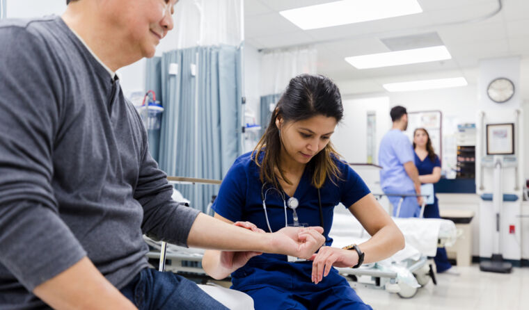 Patient getting examined at urgent care clinic