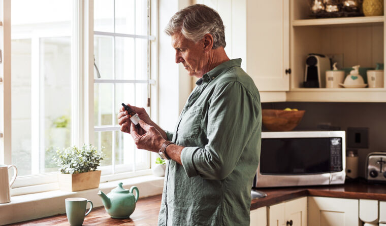 A patient looking at medication