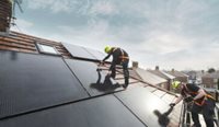 Tradies installing solar panels.